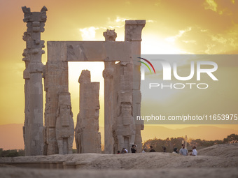 Iranian people visit the Persepolis historical site near the city of Shiraz in Fars province, about 932 km (579 miles) south of Tehran, Iran...