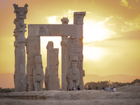 Iranian people visit the Persepolis historical site near the city of Shiraz in Fars province, about 932 km (579 miles) south of Tehran, Iran...