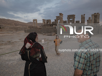 An Iranian family visits the Persepolis historical site near the city of Shiraz in Fars province, about 932 km (579 miles) south of Tehran,...