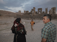 An Iranian family visits the Persepolis historical site near the city of Shiraz in Fars province, about 932 km (579 miles) south of Tehran,...