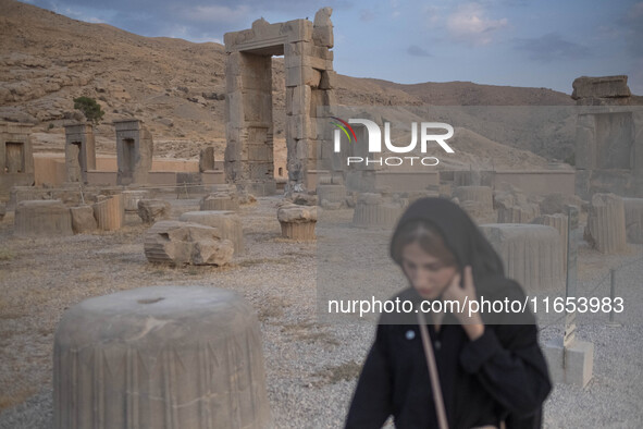 A young Iranian woman visits the Persepolis historical site near the city of Shiraz in Fars province, about 932 km (579 miles) south of Tehr...