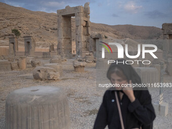 A young Iranian woman visits the Persepolis historical site near the city of Shiraz in Fars province, about 932 km (579 miles) south of Tehr...