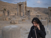 A young Iranian woman visits the Persepolis historical site near the city of Shiraz in Fars province, about 932 km (579 miles) south of Tehr...