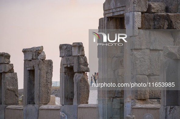 An Iranian family visits the Persepolis historical site near the city of Shiraz in Fars province, about 932 km (579 miles) south of Tehran,...