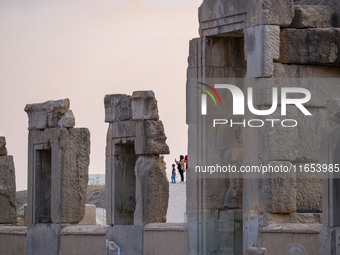 An Iranian family visits the Persepolis historical site near the city of Shiraz in Fars province, about 932 km (579 miles) south of Tehran,...