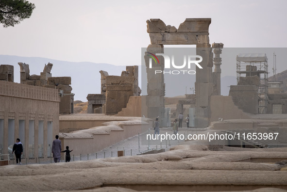 Iranian people visit the Persepolis historical site near the city of Shiraz in Fars province, about 932 km (579 miles) south of Tehran, Iran...