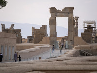 Iranian people visit the Persepolis historical site near the city of Shiraz in Fars province, about 932 km (579 miles) south of Tehran, Iran...