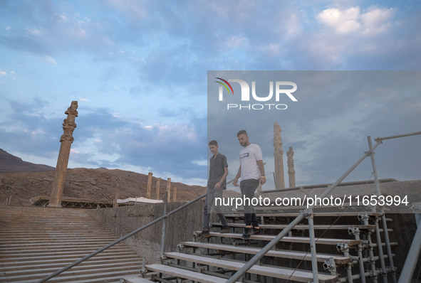 Iranian youths visit the Persepolis historical site near the city of Shiraz in Fars province, about 932 km (579 miles) south of Tehran, Iran...