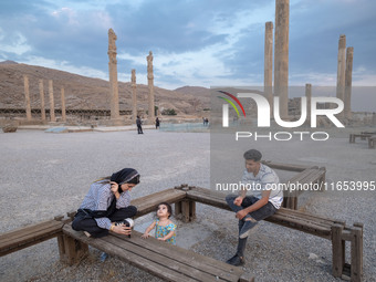 An Iranian family visits the Persepolis historical site near the city of Shiraz in Fars province, about 932 km (579 miles) south of Tehran,...