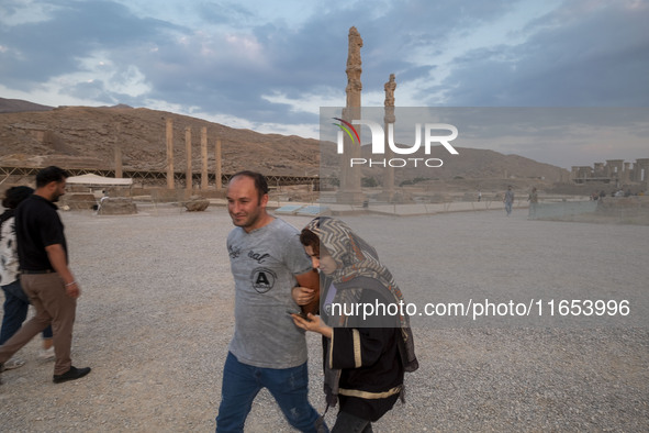 Iranian youths visit the Persepolis historical site near the city of Shiraz in Fars province, about 932 km (579 miles) south of Tehran, Iran...