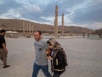 Iranian youths visit the Persepolis historical site near the city of Shiraz in Fars province, about 932 km (579 miles) south of Tehran, Iran...