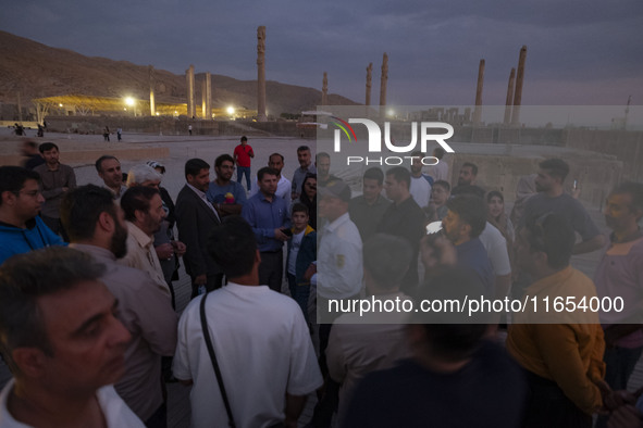 Iranian people visit the Persepolis historical site near the city of Shiraz in Fars province, about 932 km (579 miles) south of Tehran, Iran...