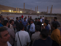 Iranian people visit the Persepolis historical site near the city of Shiraz in Fars province, about 932 km (579 miles) south of Tehran, Iran...