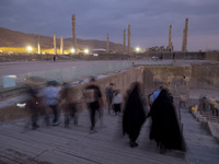 Iranian people visit the Persepolis historical site near the city of Shiraz in Fars province, about 932 km (579 miles) south of Tehran, Iran...