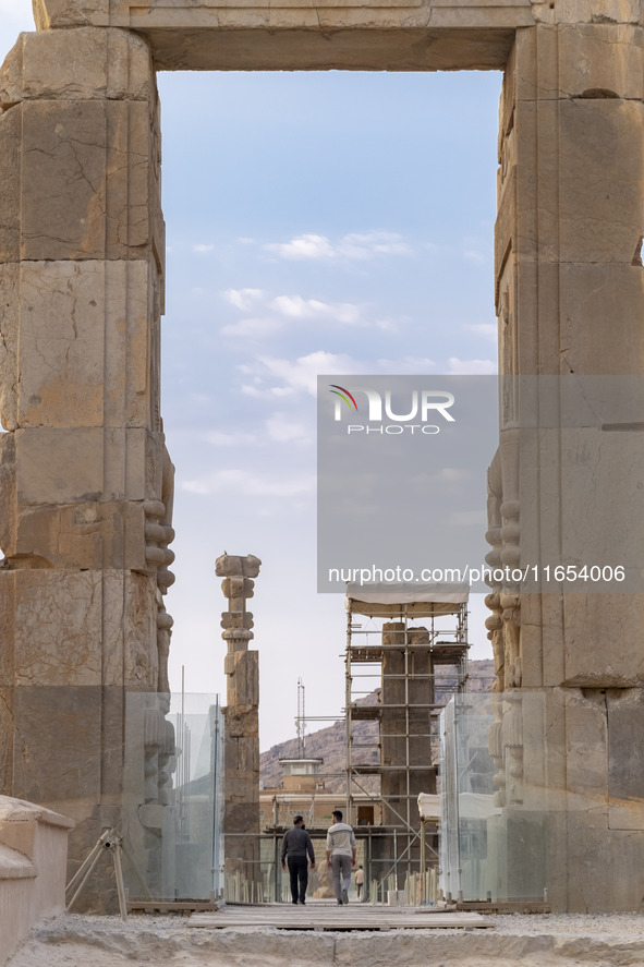 Two Iranian men visit the Persepolis historical site near the city of Shiraz in Fars province, about 932 km (579 miles) south of Tehran, Ira...