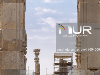 Two Iranian men visit the Persepolis historical site near the city of Shiraz in Fars province, about 932 km (579 miles) south of Tehran, Ira...