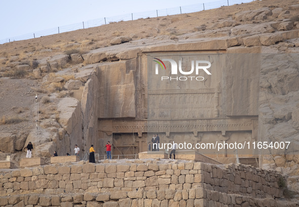 Iranian people visit the Persepolis historical site near the city of Shiraz in Fars province, about 932 km (579 miles) south of Tehran, Iran...