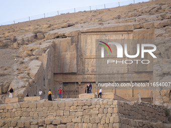 Iranian people visit the Persepolis historical site near the city of Shiraz in Fars province, about 932 km (579 miles) south of Tehran, Iran...