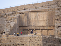 Iranian people visit the Persepolis historical site near the city of Shiraz in Fars province, about 932 km (579 miles) south of Tehran, Iran...