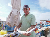 A fisherman is seen in Glyfada in Athens, Greece, on October 10, 2024. (