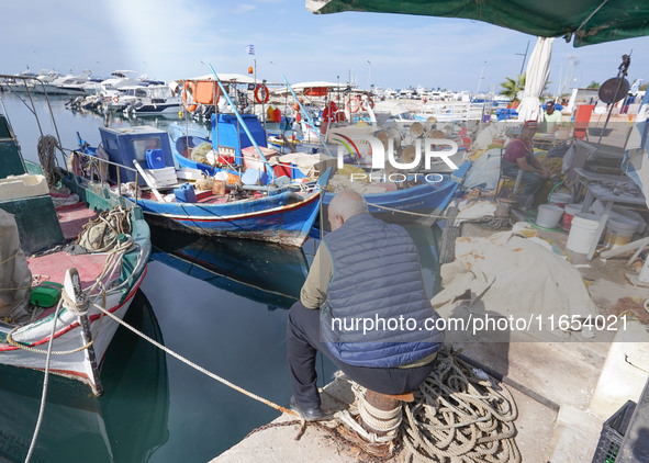 A fisherman is seen in Glyfada in Athens, Greece, on October 10, 2024. 