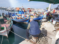 A fisherman is seen in Glyfada in Athens, Greece, on October 10, 2024. (