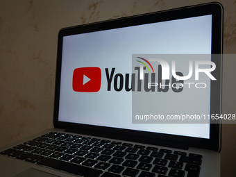 A YouTube logo displayed on a laptop screen is seen in L’Aquila, Italy, on October 9th, 2024. (