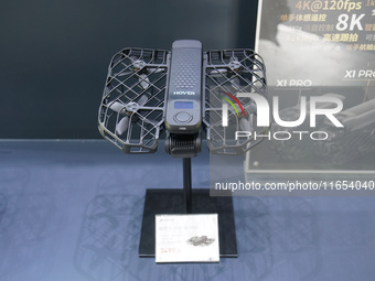 Drone products are displayed at the International Consumer Electronics Show in Shanghai, China, on October 10, 2024. (