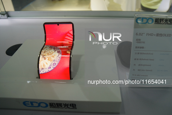 Mobile phone products are displayed at the International Consumer Electronics Show in Shanghai, China, on October 10, 2024. 