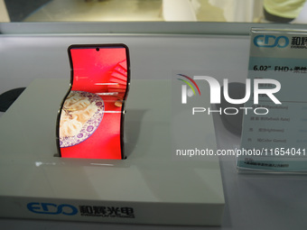 Mobile phone products are displayed at the International Consumer Electronics Show in Shanghai, China, on October 10, 2024. (