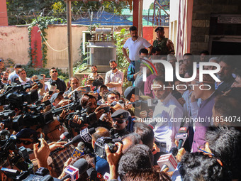 Jammu and Kashmir National Conference (JKNC) party leader Omar Abdullah (Right) speaks with the media after a meeting at JKNC headquarters i...