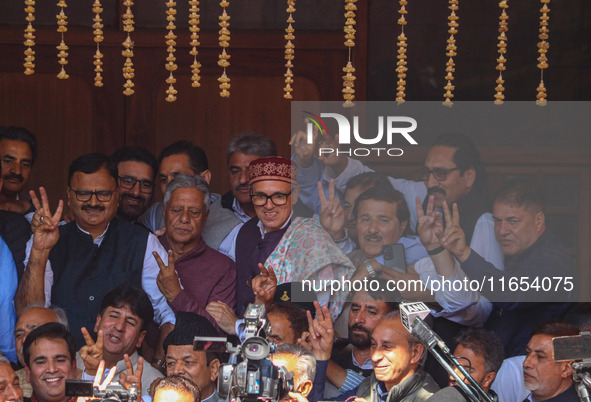 Jammu and Kashmir National Conference (JKNC) party leader Omar Abdullah (center) looks on after a meeting at JKNC headquarters in Srinagar,...