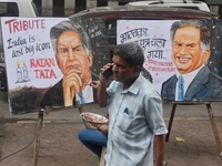 A teacher at Gurukul Art School paints a mural of Ratan Tata as a tribute in Mumbai, India, on October 10, 2024. Ratan Tata is the businessm...