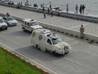 A hearse vehicle is seen with the mortal remains of Indian industrialist Ratan Tata ahead of the cremation in Mumbai, India, on October 10,...