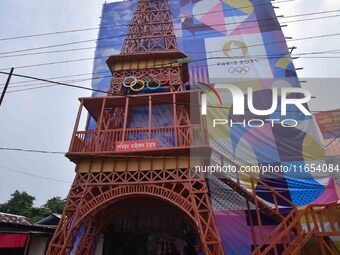 A community 'puja pandal' with a Paris Olympics theme is present during the Durga Puja festival in Nagaon District, Assam, India, on October...