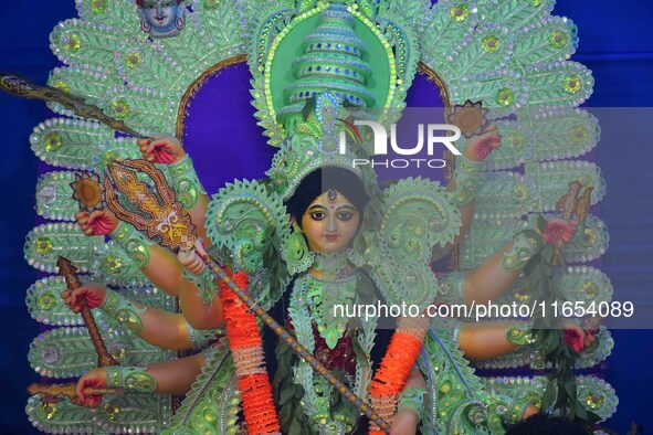 An idol of Goddess Durga is present during the Durga Puja festival in Nagaon District, Assam, India, on October 10, 2024. 