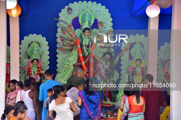 An idol of Goddess Durga is present during the Durga Puja festival in Nagaon District, Assam, India, on October 10, 2024. 