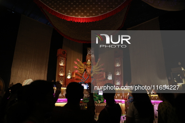 People visit a ''pandal'' or temporary platform during the Durga Puja festival in Kolkata, India, on October 10, 2024. The annual Durga Puja...