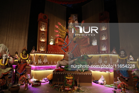 A Hindu goddess Durga is pictured inside a ''pandal'' or temporary platform during the Durga Puja festival in Kolkata, India, on October 10,...