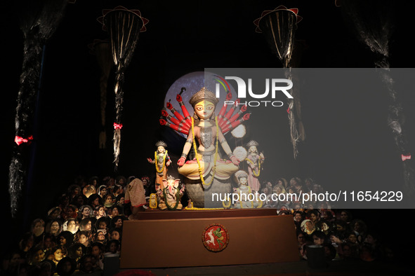 A Hindu goddess Durga is pictured inside a ''pandal'' or temporary platform during the Durga Puja festival in Kolkata, India, on October 10,...