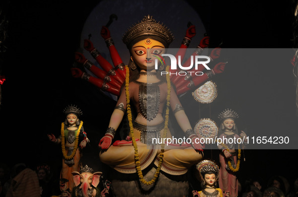 A Hindu goddess Durga is pictured inside a ''pandal'' or temporary platform during the Durga Puja festival in Kolkata, India, on October 10,...