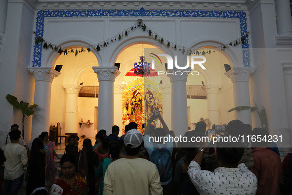 People visit a heritage house during the Durga Puja festival in Kolkata, India, on October 10, 2024. The annual Durga Puja festival is one o...