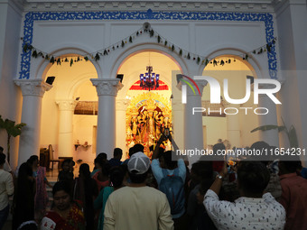 People visit a heritage house during the Durga Puja festival in Kolkata, India, on October 10, 2024. The annual Durga Puja festival is one o...