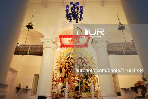 A Hindu goddess Durga is pictured inside a heritage house during the Durga Puja festival in Kolkata, India, on October 10, 2024. The annual...