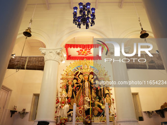 A Hindu goddess Durga is pictured inside a heritage house during the Durga Puja festival in Kolkata, India, on October 10, 2024. The annual...