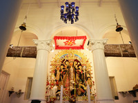 A Hindu goddess Durga is pictured inside a heritage house during the Durga Puja festival in Kolkata, India, on October 10, 2024. The annual...