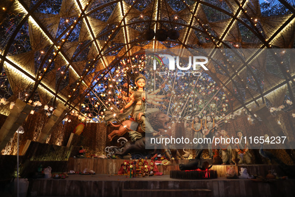 A Hindu goddess Durga is pictured inside a ''pandal'' or temporary platform during the Durga Puja festival in Kolkata, India, on October 10,...