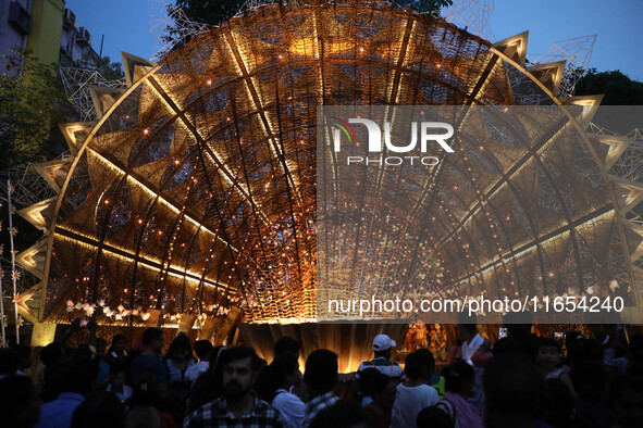 People visit a ''pandal'' or temporary platform during the Durga Puja festival in Kolkata, India, on October 10, 2024. The annual Durga Puja...