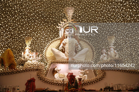 A Hindu goddess Durga is pictured inside a ''pandal'' or temporary platform during the Durga Puja festival in Kolkata, India, on October 10,...