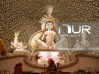 A Hindu goddess Durga is pictured inside a ''pandal'' or temporary platform during the Durga Puja festival in Kolkata, India, on October 10,...